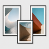 Custom photo framed prints featuring modern architectural artwork in black frames with white matting