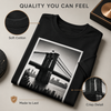 Folded black custom T-shirt highlighting soft cotton fabric and crisp print detail