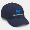 Navy cotton twill cap with custom embroidered Link Printers logo and pre-curved bill
