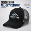 Black and gray embroidered trucker hat featuring breathable mesh panels for all-day comfort.