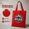 Red reusable cotton canvas tote bag printed with an Atlas Fitness logo and a close-up of the stitched handle.