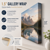 Premium custom canvas wall art featuring a stunning mountain lake landscape with snow-capped peaks and golden sunset reflections. Displayed in a luxury light gray studio background with a clean, modern, minimalist style. High-quality gallery-wrapped canvas print with realistic texture, elegant presentation, and professional home or office décor appeal.