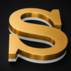 Custom brushed gold stainless steel LED backlit channel letter sign