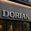 Dimensional natural brushed silver metal letter mounted on exterior building facade