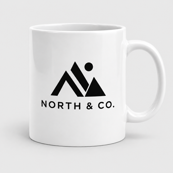 White 11 oz ceramic mug customized with a black North & Co. logo.
