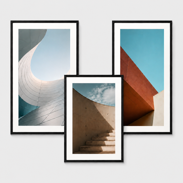 Custom photo framed prints featuring modern architectural artwork in black frames with white matting