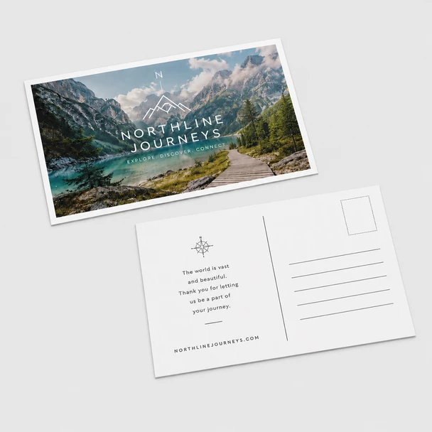 Front and back of a Northline Journeys postcard featuring a mountain lake photograph, message area, address lines, and postage box.