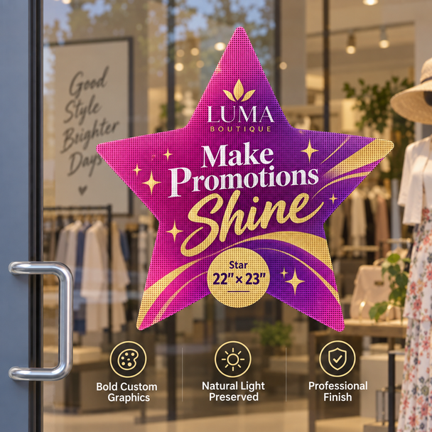 Pink star-shaped Luma Boutique window decal with gold accents and promotional lettering displayed on storefront glass.