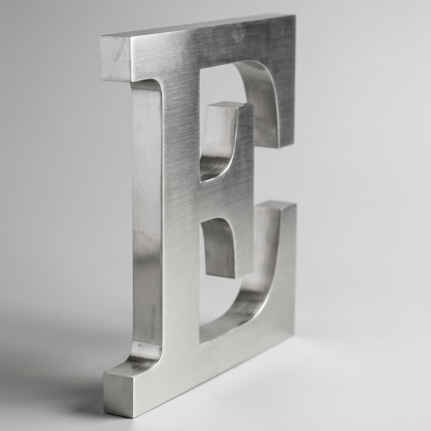 Custom 3D brushed stainless steel letter sign with natural silver hairline finish