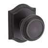 Baldwin PSTRATAR112  Reserve Passage Traditional with Traditional Arch Rose in Aged Bronze Finish.