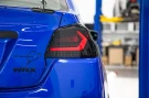 OLM Evolution Tail Lights (Smoked Lens, Black Base, White Bar) - 2015-2021 WRX / STI OLMA.70032.1-SB