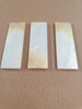 White Mother of Pearl flat inlay blanks size 22mm (0.9") width x 67mm (2.73") length x 2.5mm (0.10") thickness B grade clean on both sides, has some gold/shell skin on ends of one face of blank, other side pure white.
