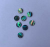 Paua shell discs 14mm (0.55") diameter x 1.3mm (0.05") thickness polished both sides. Round flat shell pcs cut to precise diameter and thickness. Ideal for use in inlay applications, watch dials or jewellery decorations.