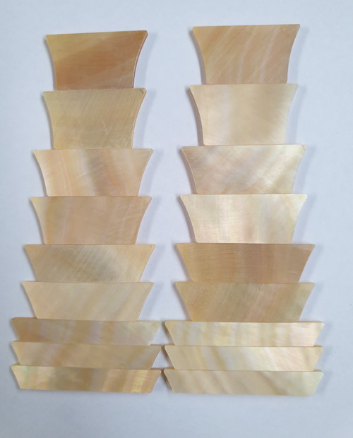 A set of 9pcs Gold MOP crown inlays. Suitable for Les Paul or SG style guitars. Shell thickness 1.5mm. Flat and ready to be installed.