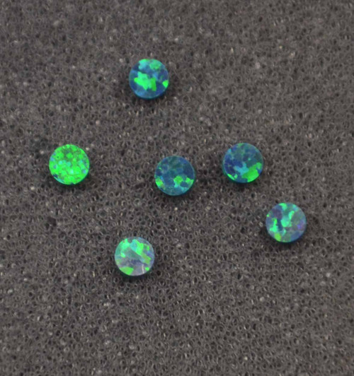 Opal dots OP19 3 x 1.3mm flat pcs made to specific diameter and thickness made from manufactured opal suitable for inlay, fingerboard markers, jewellery, Opal dots can be worked same way as mother of pearl and are of similar hardness.