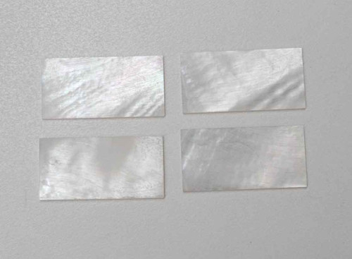 White Mother of Pearl flat inlay blanks size 30mm (1.18") width x 50mm (1.97") length x 2mm (0.08") thickness Polished 1 side A grade good on both sides.