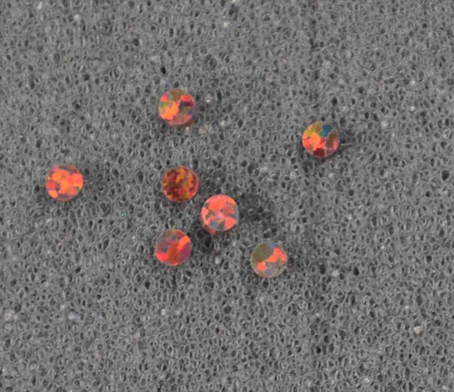 Opal dots OP20 2 x 1.3mm flat pcs made to specific diameter and thickness made from manufactured opal suitable for inlay, fingerboard markers, jewellery, Opal dots can be worked same way as mother of pearl and are of similar hardness.