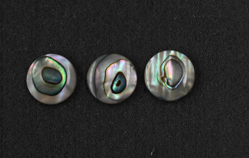 Green abalone domed finger button inlay 14.22mm (0.56") diameter 2.3mm (0.09") thickness domed and polished on 1 side round pcs Ideal for use in brasswind or woodwind instruments as well as accordions and general inlay or jewellery decorations. All pcs are A grade.