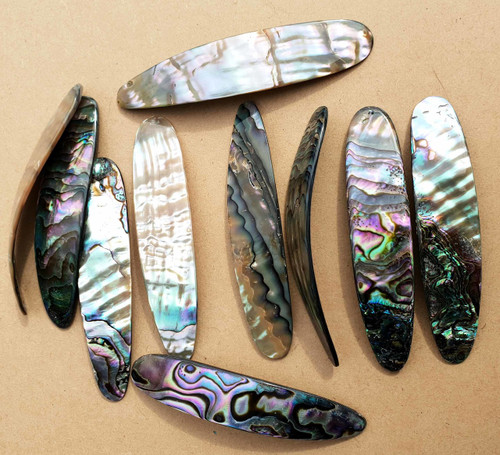 Green abalone shell fishing lures (fishing spoons) are specially cut and polished solid shell pcs. Size 19-20mm (0.79") width  x 85-90mm(3.35- 3.54") x 1.5-2mm (0.06) length Made to specific bent shape with no holes to to fit swivels. Made using A grade shell.