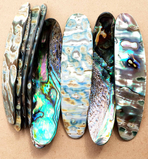 Paua  fishing lures (fishing spoons) with whole are specially cut and polished solid shell pcs. Size 19-20 x 85-90 x 1.5-2mm Made to specific bent shape with holes to to fit swivels.