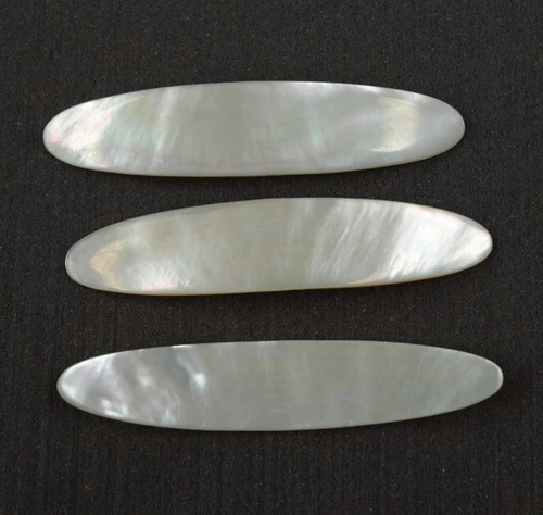 White Mother of Pearl fishing lures (fishing spoons) size 22mm wide x 120mm long specially cut and polished solid shell pcs. Made to specific bent shape no holes.