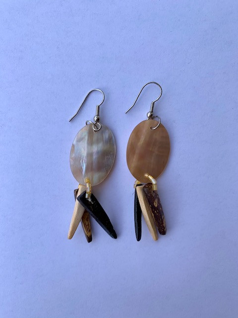 Genuine shell earrings, made from real mother of pearl shells. Beautiful present for a special someone or to spoil yourself. Each set of earrings are handmade.