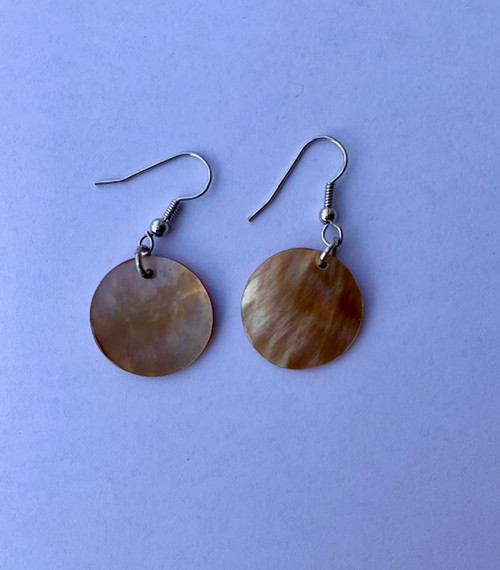 Genuine shell earrings, made from real mother of pearl shells. Beautiful present for a special someone or to spoil yourself. Each set of earrings are handmade.