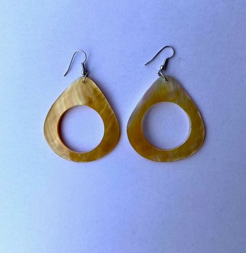 Genuine shell earrings, made from real mother of pearl shells. Beautiful present for a special someone or to spoil yourself. Each set of earrings are handmade.