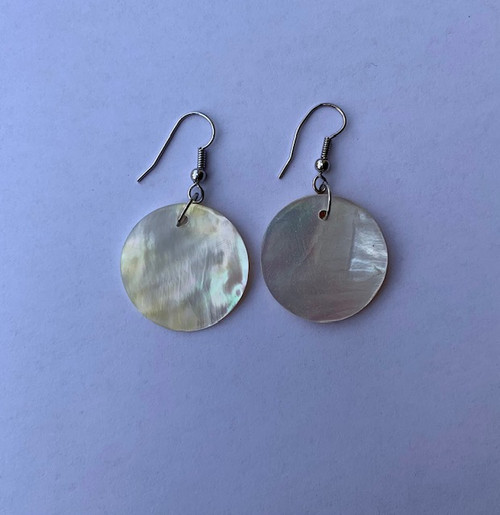 Genuine shell earrings, made from real mother of pearl shells. Beautiful present for a special someone or to spoil yourself. Each set of earrings are handmade.