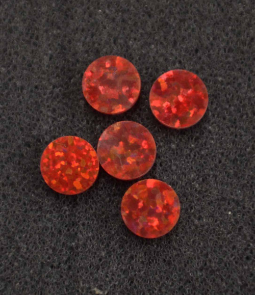 Opal dots OP45 9.5 x 1.3mm flat pcs made to specific diameter and thickness made from manufactured opal suitable for inlay, fingerboard markers, jewellery, Opal dots can be worked same way as mother of pearl and are of similar hardness.
