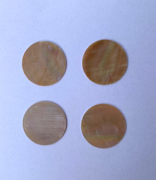 Australian Greenlip abalone shell dots 29mm diameter 0.5mm thickness polished 1 side round flat shell pcs cut to precise diameter and thickness. Ideal for use in inlay applications - for fretboard markers and general inlay or jewellery decorations. All dots are A grade.