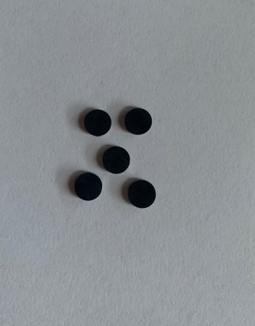 Onyx SONYX reconstituted stone dots 7mm diameter x 1.3mm thickness - round flat pcs cut to precise diameter and thickness. Ideal for use in inlay applications - for fretboard markers, and general inlay or jewellery decorations. All dots are A grade good on both sides.