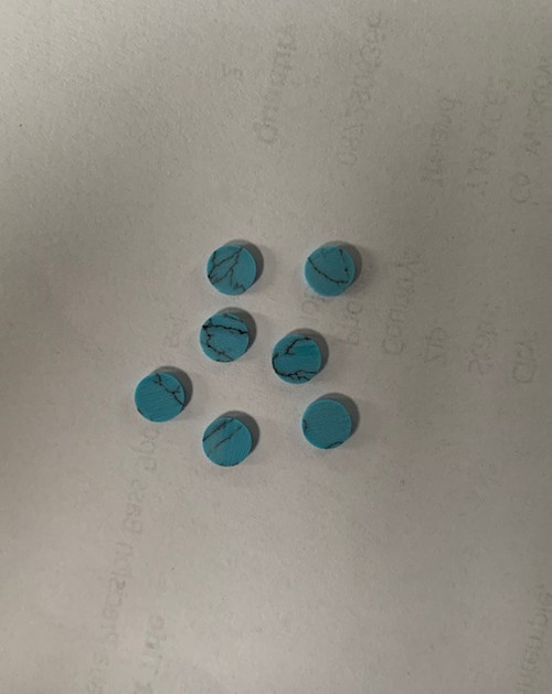 Turquoise STURB1 dots 6mm diameter x 1.3mm thickness - round flat pcs cut to precise diameter and thickness. Ideal for use in inlay applications - for fretboard markers, and general inlay or jewellery decorations. All dots are A grade good on both sides.