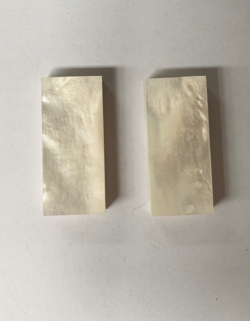 White Mother of Pearl flat inlay blanks size 20mm (0.79") width x 45mm (1.78") length x 6mm (0.24") thickness A grade clean on both sides.