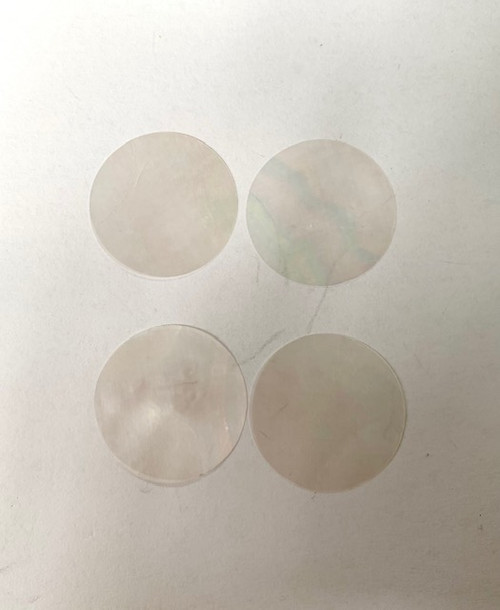 White Mother of Pearl discs 30mm (1.18") diameter x 0.4mm (0.0016") thickness - round flat shell pcs cut to precise diameter and thickness. Ideal for watch dials and jewellery decorations. All discs are A grade good on both sides.<br />