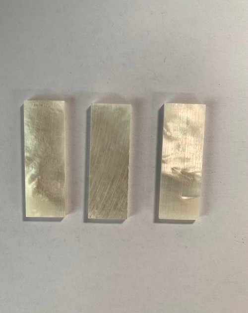 White Mother of Pearl flat figured inlay blanks  size 12mm (0.47") width x 35mm (1.38") length x 2mm (0.08") thickness. A grade good on both sides.