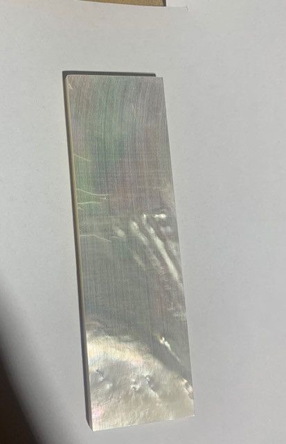 White Mother of Pearl flat inlay blanks size 33mm (1.3") width x 80mm (3.15") length x 3.5mm (0.14") thickness A grade good on both sides.