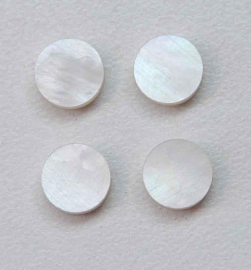 White Mother of Pearl dots 9mm diameter x 2mm thickness - round flat shell pcs cut to precise diameter and thickness. Ideal for use in inlay applications - for fretboard markers, bow frog eyes and general inlay or jewellery decorations. All dots are A grade good on both sides.<br />