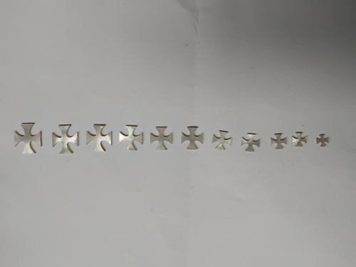 White Mother of Pearl Maltese cross inlay set. Some uses include fretboard markers, musical instrument inlay, furniture inlay and other general decorative inlay and jewellery applications. All pcs are A grade.