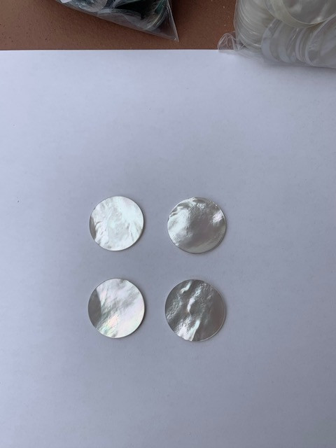 White Mother of Pearl discs polished 1 side 28mm (1.1") diameter x 0.1mm (0.0039") thickness  - round flat shell pcs cut to precise diameter and thickness. Ideal for inlay applications, watch dials and jewellery decorations. All discs are A grade good on both sides.