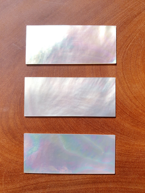 White Mother of Pearl flat blanks clear face (no figure) polished 1 side size 30mm (1.18") width x 50mm (1.97") length x 1mm (0.04") thickness A grade good on both sides.