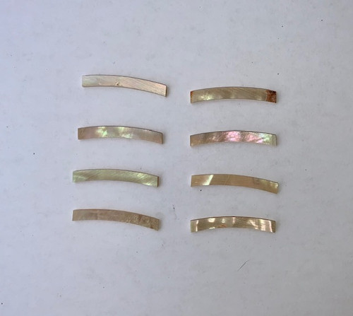 Awabi solid shell curved strips 4.76mm (0.187") width x 25mm (1") length x 1.3mm (0.05") thickness x 110mm (4.33") inside diameter. A grade quality good on both sides, flat and uniform in thickness and width. Ideal for use in purfling and rosettes on musical instruments - Ukuleles, guitars, mandolins etc. as well as in furniture, jewellery ans other decorative applications.