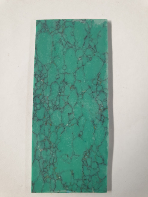 Turquoise Green M114 artificial stone blanks 30 x 80 x 3.5mm suitable for inlay. Can be cut with standard cutting tools - jewellery saw similar in characteristics to mother of pearl (hardness approx. 3. Can be sanded and polished same way as shell material. All pcs are A grade good on both sides.