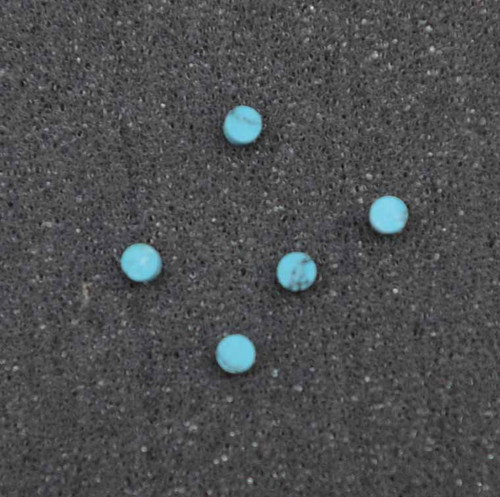 Turquoise STURB1 dots 3 x 1.3mm diameter x 1.3mm thickness - round flat pcs cut to precise diameter and thickness. Ideal for use in inlay applications - for fretboard markers, and general inlay or jewellery decorations. All dots are A grade good on both sides.