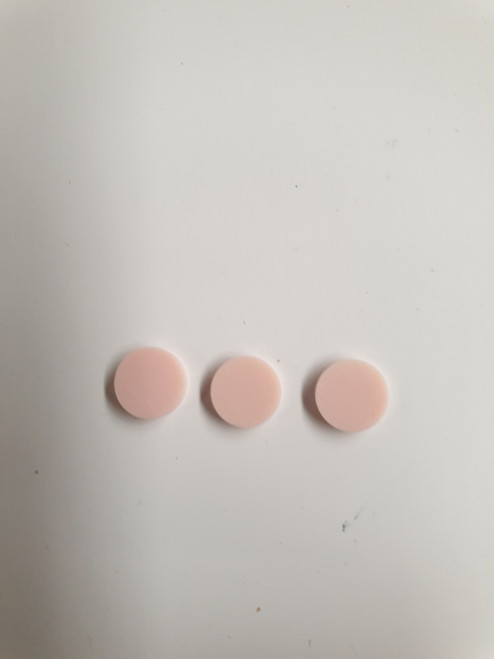 Pink stone RPINK1 artificial stone dots 6 x 1.3mm thickness - round flat pcs cut to precise diameter and thickness. Ideal for use in inlay applications - for fretboard markers, and general inlay or jewellery decorations. All dots are A grade good on both sides.