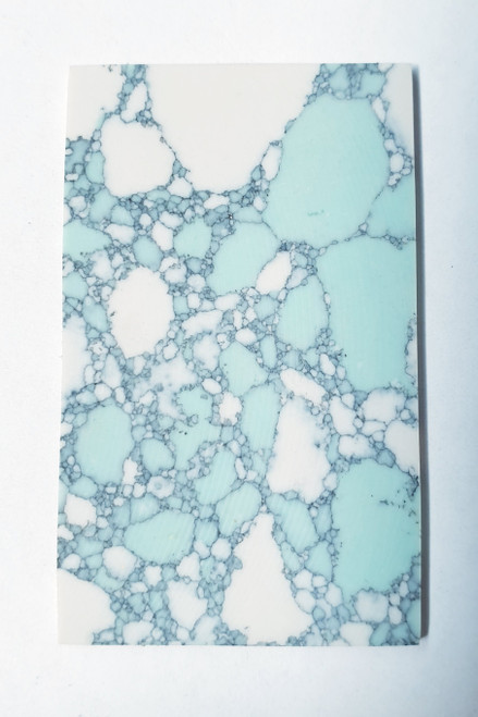 Marble Moravian CH2C6 artificial stone blanks 30 x 50 x 2.5mm suitable for inlay. Can be cut with standard cutting tools - jewellery saw similar in characteristics to mother of pearl hardness approx. 3. Can be sanded and polished same way as shell material. All pcs are A grade good on both sides.