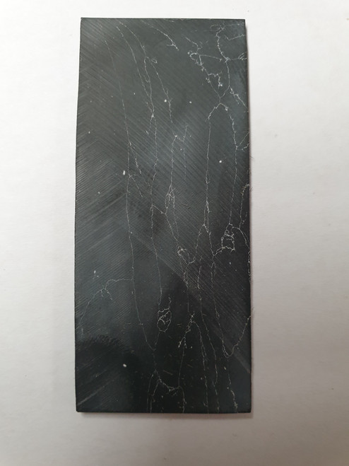 Marble black blanks F050 artificial stone blanks 30 x 50 x 2mm suitable for inlay. Can be cut with standard cutting tools - jewellery saw similar in characteristics to mother of pearl (hardness approx. 3. Can be sanded and polished same way as shell material. All pieces are A grade good on both sides.