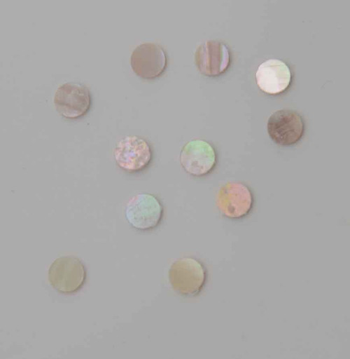 Australian Greenlip abalone shell dots 6.5mm diameter 1.3mm thickness are round flat shell pcs cut to precise diameter and thickness. Ideal for use in inlay applications - for fretboard markers and general inlay or jewellery decorations. All dots are A grade.