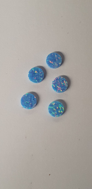 Opal dots OP74 7 x 1.3mm flat pcs made to specific diameter and thickness made from manufactured opal suitable for inlay, fretboard markers, jewellery, Opal dots can be worked same way as mother of pearl and are of similar hardness..