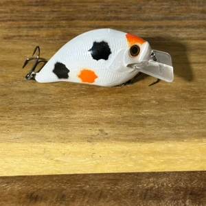 Blind Squirrel Baits hand painted square bill crank bait in our spotted cow pattern.